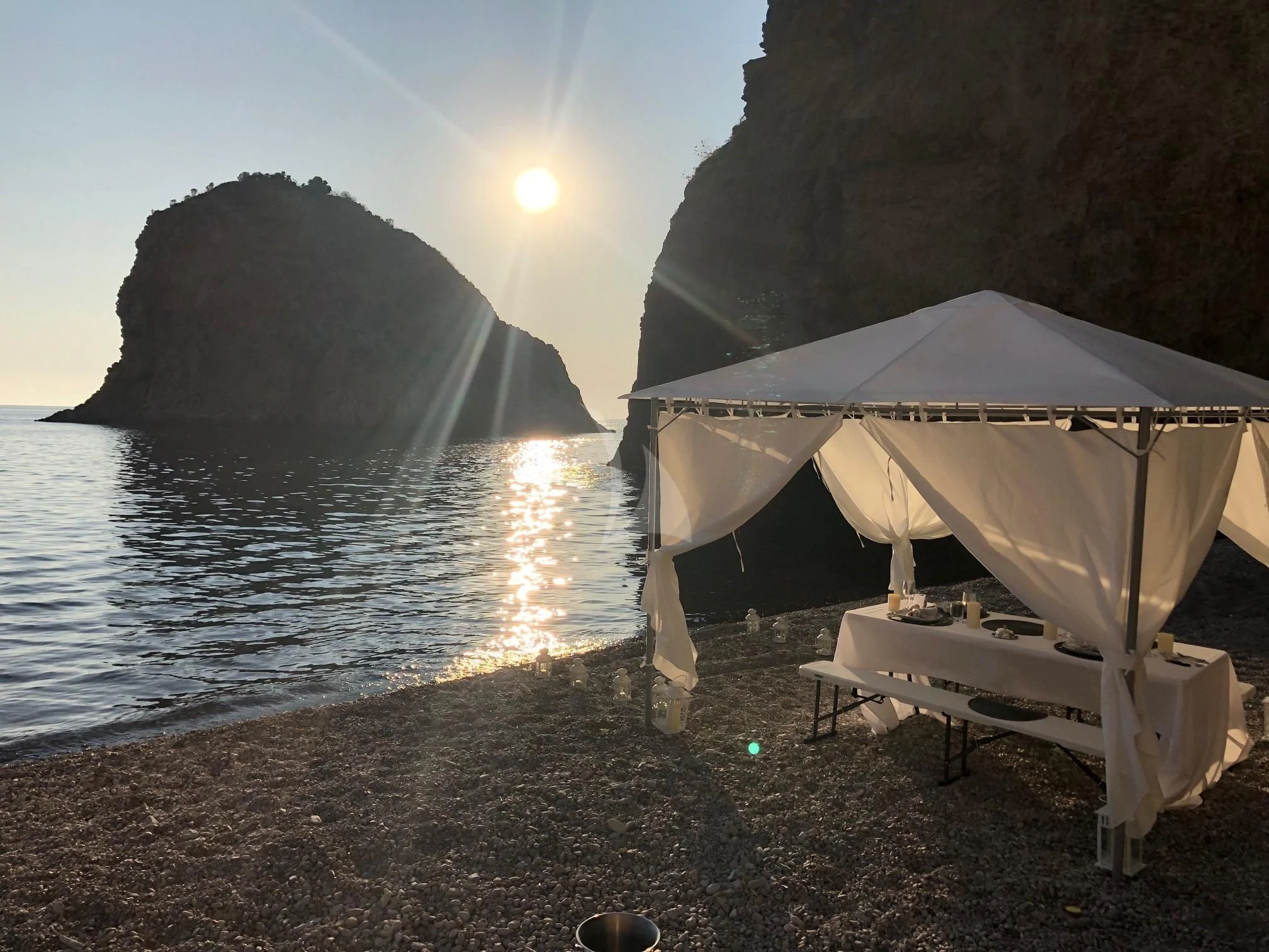a tent on a beach aboard CALYPSO I Yacht for Charter