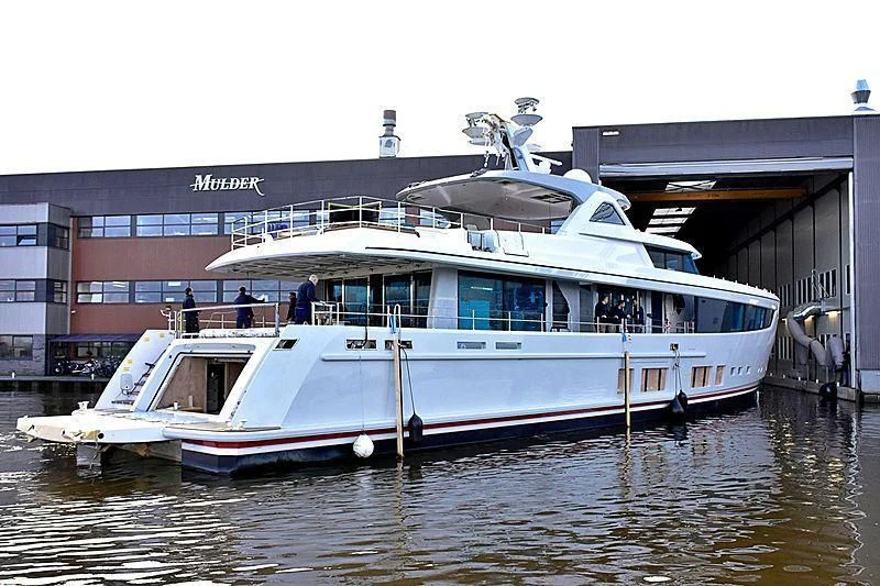 a boat docked at a pier aboard CALYPSO I Yacht for Charter