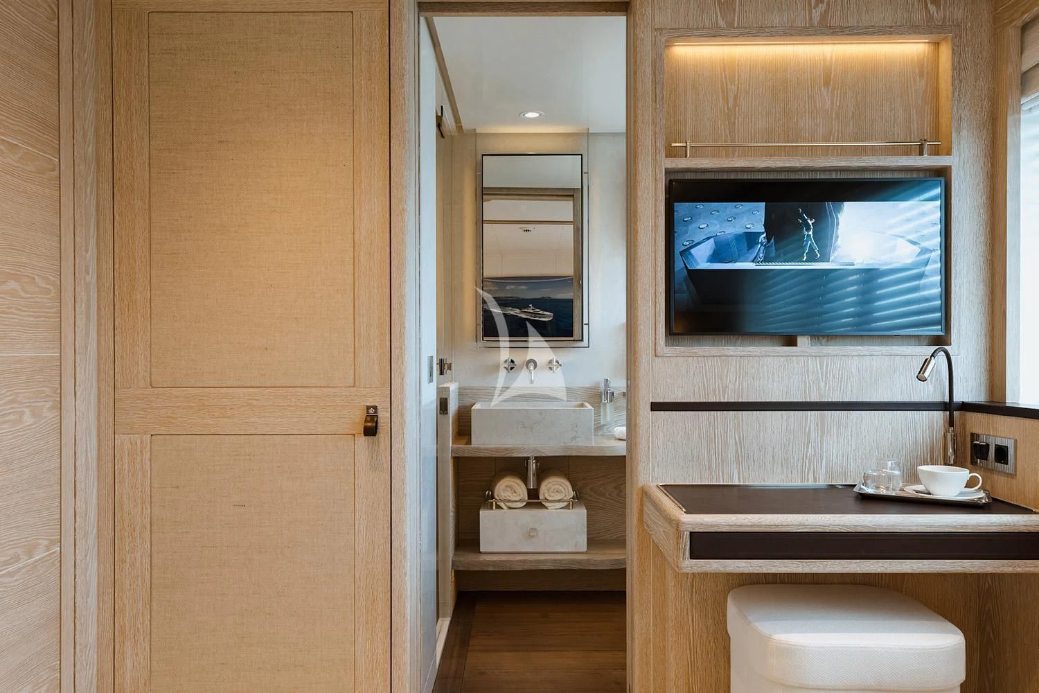 a bathroom with a mirror and a toilet aboard CALYPSO I Yacht for Charter