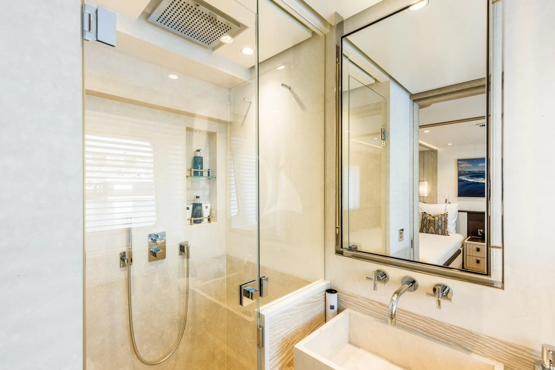 a bathroom with a shower unit and sink aboard CALYPSO I Yacht for Charter
