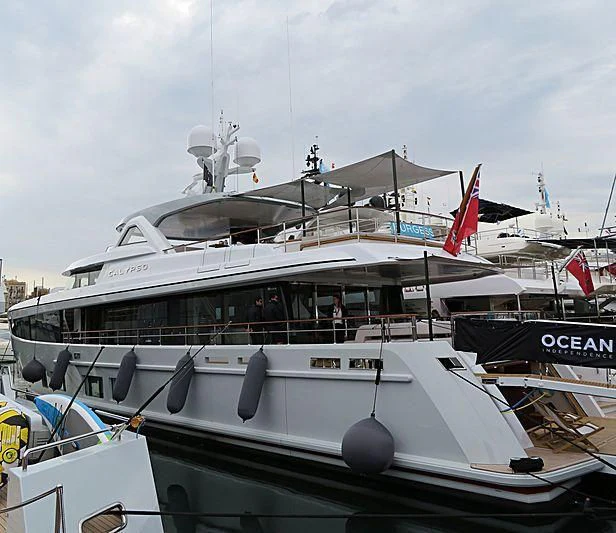 a boat is parked in a harbor aboard CALYPSO I Yacht for Charter