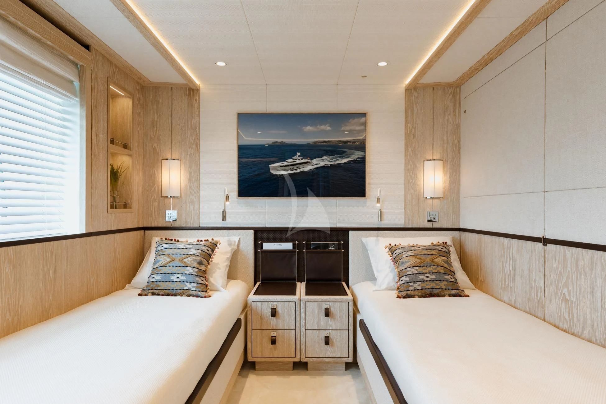 a hotel room with two beds aboard CALYPSO I Yacht for Charter