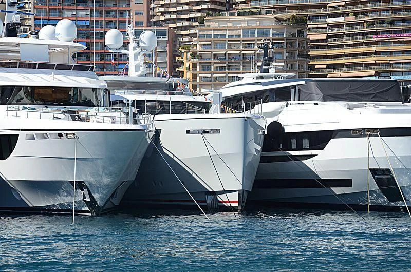 several boats docked in a harbor aboard CALYPSO I Yacht for Charter