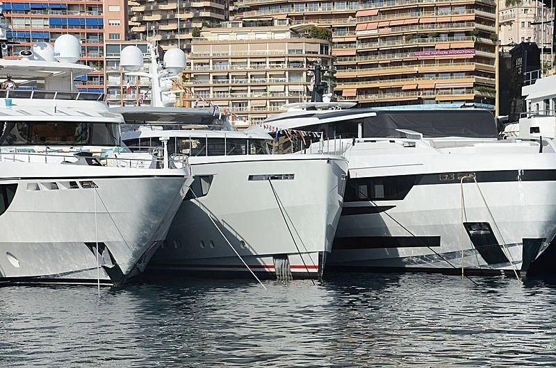 several boats docked in a harbor aboard CALYPSO I Yacht for Charter