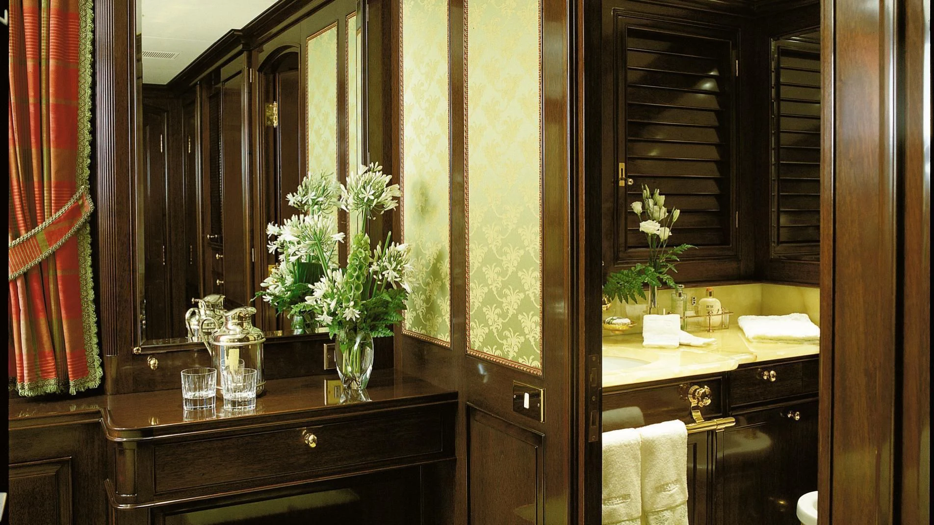 a bathroom with a large mirror aboard ROCK & ROLL Yacht for Sale