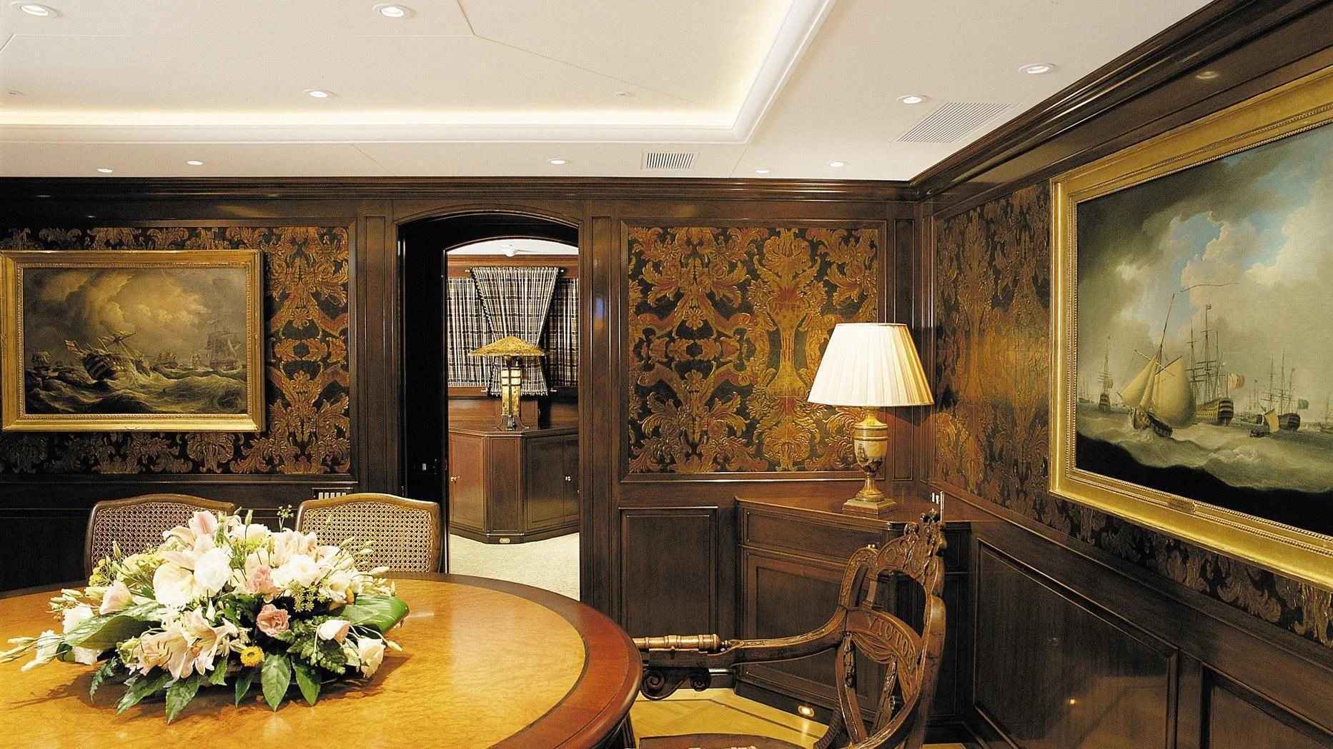 a dining room with a table and chairs aboard ROCK & ROLL Yacht for Sale