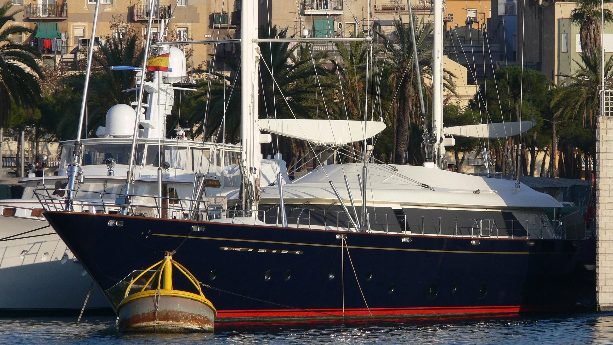 a boat docked in a harbor aboard ROCK & ROLL Yacht for Sale