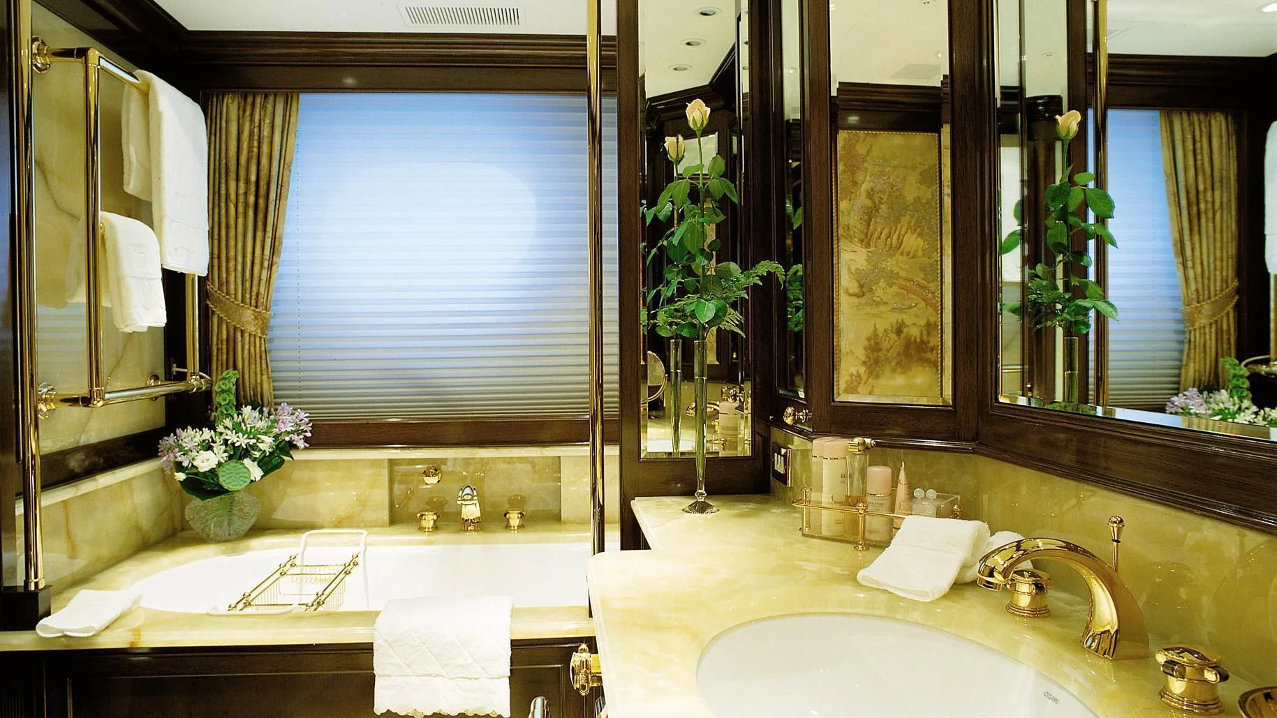 a bathroom with a large bathtub and a large window aboard ROCK & ROLL Yacht for Sale