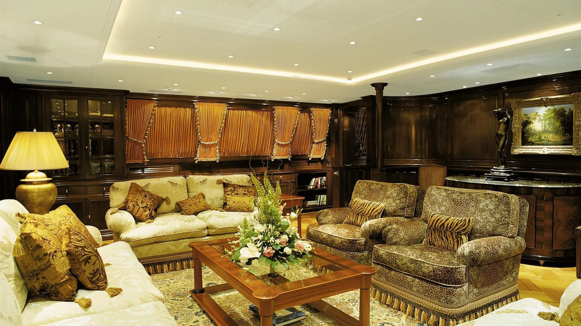 a living room with a large wood wall aboard ROCK & ROLL Yacht for Sale