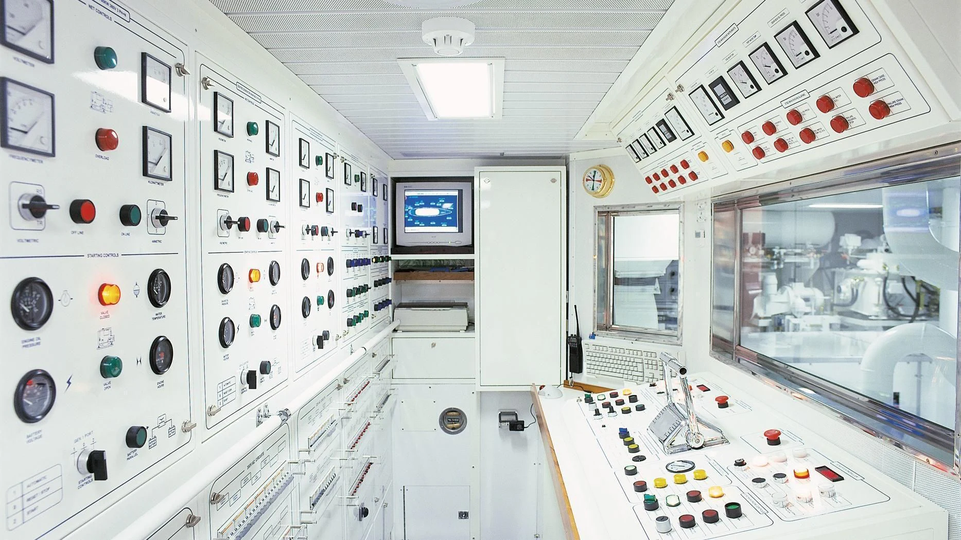 a room with white walls and white cabinets and a large window aboard ROCK & ROLL Yacht for Sale