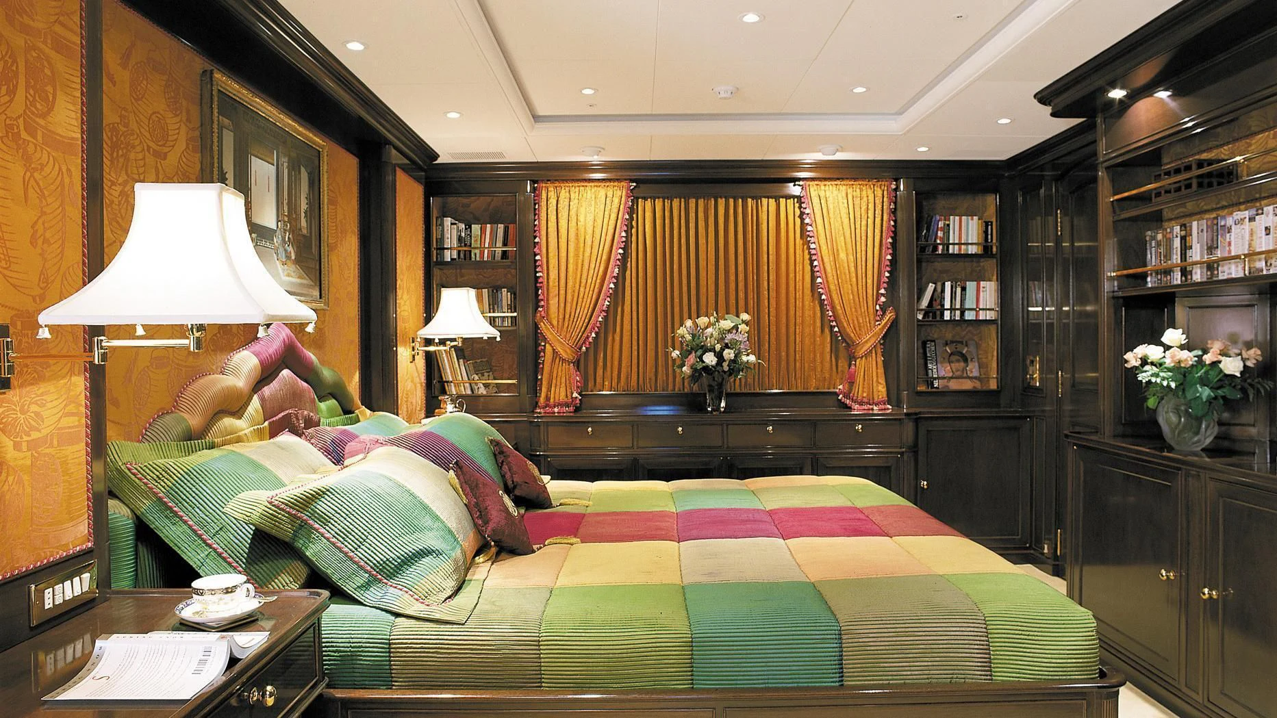 a bedroom with a bed and a lamp aboard ROCK & ROLL Yacht for Sale