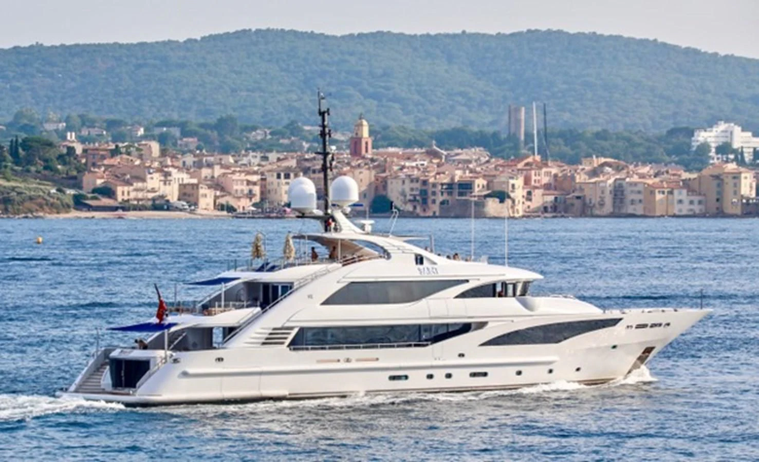 a white yacht on the water aboard ALI BABA Yacht for Sale