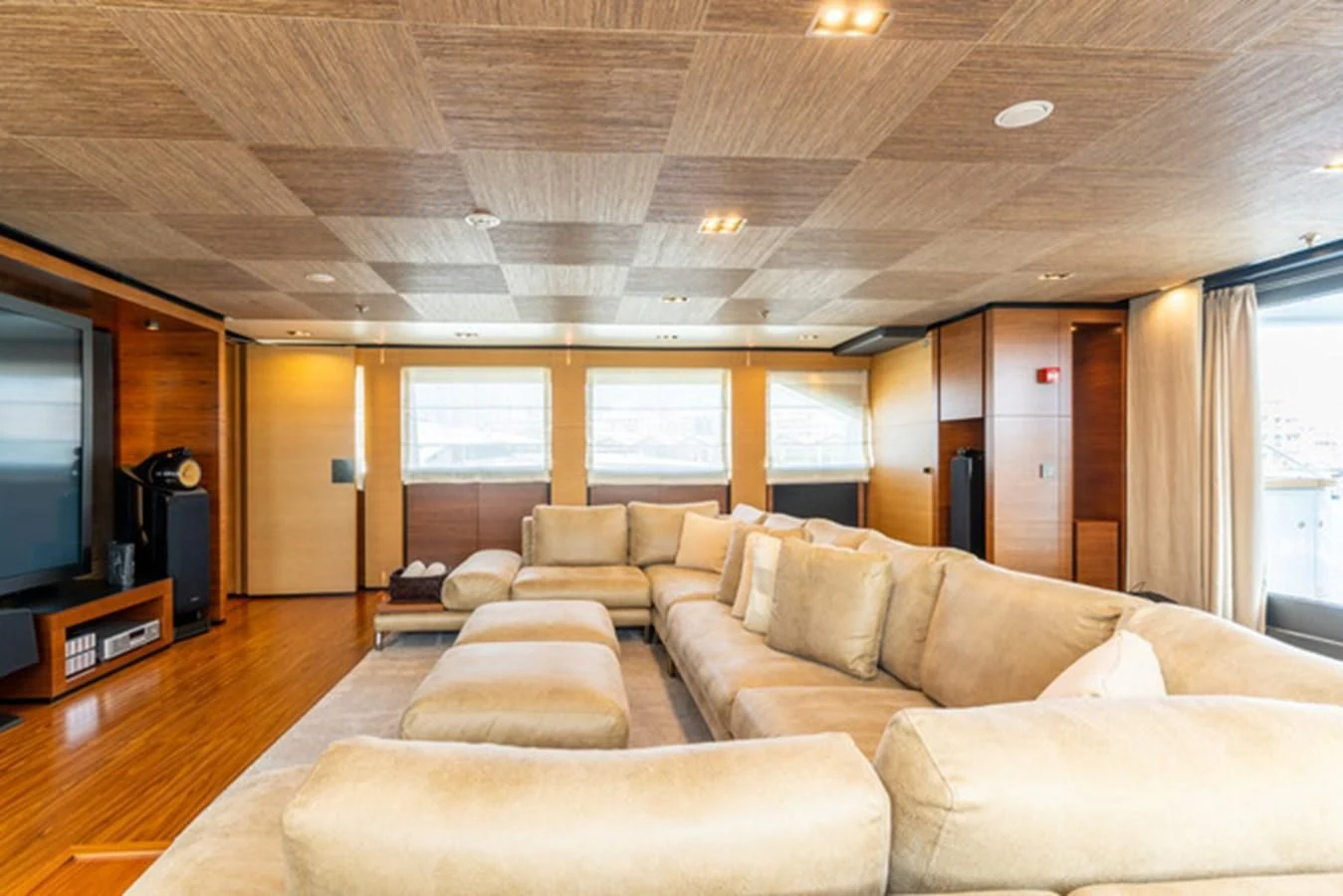 a living room with a couch and a tv aboard ALI BABA Yacht for Sale