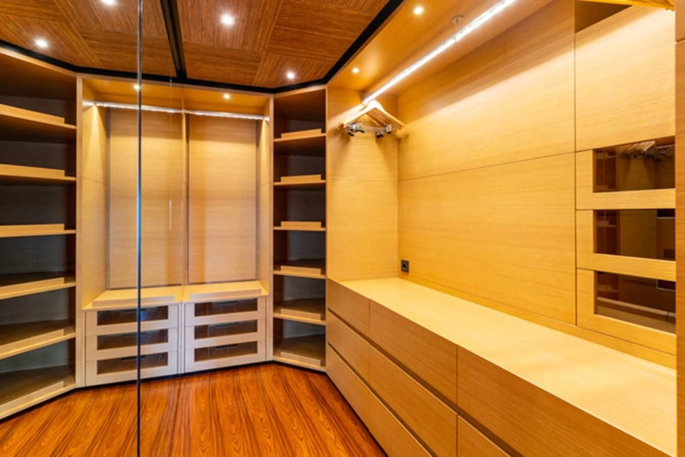 a room with a large shelf aboard ALI BABA Yacht for Sale