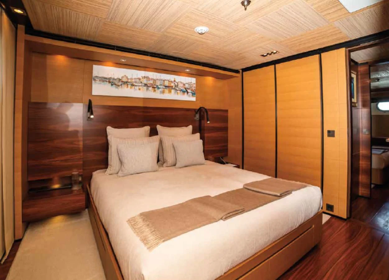 a bed in a room aboard ALI BABA Yacht for Sale