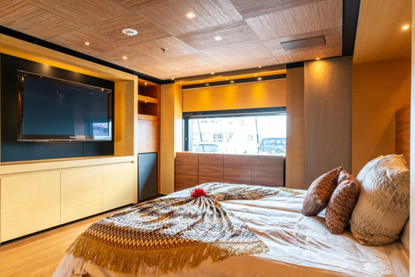 a large bed in a room aboard ALI BABA Yacht for Sale
