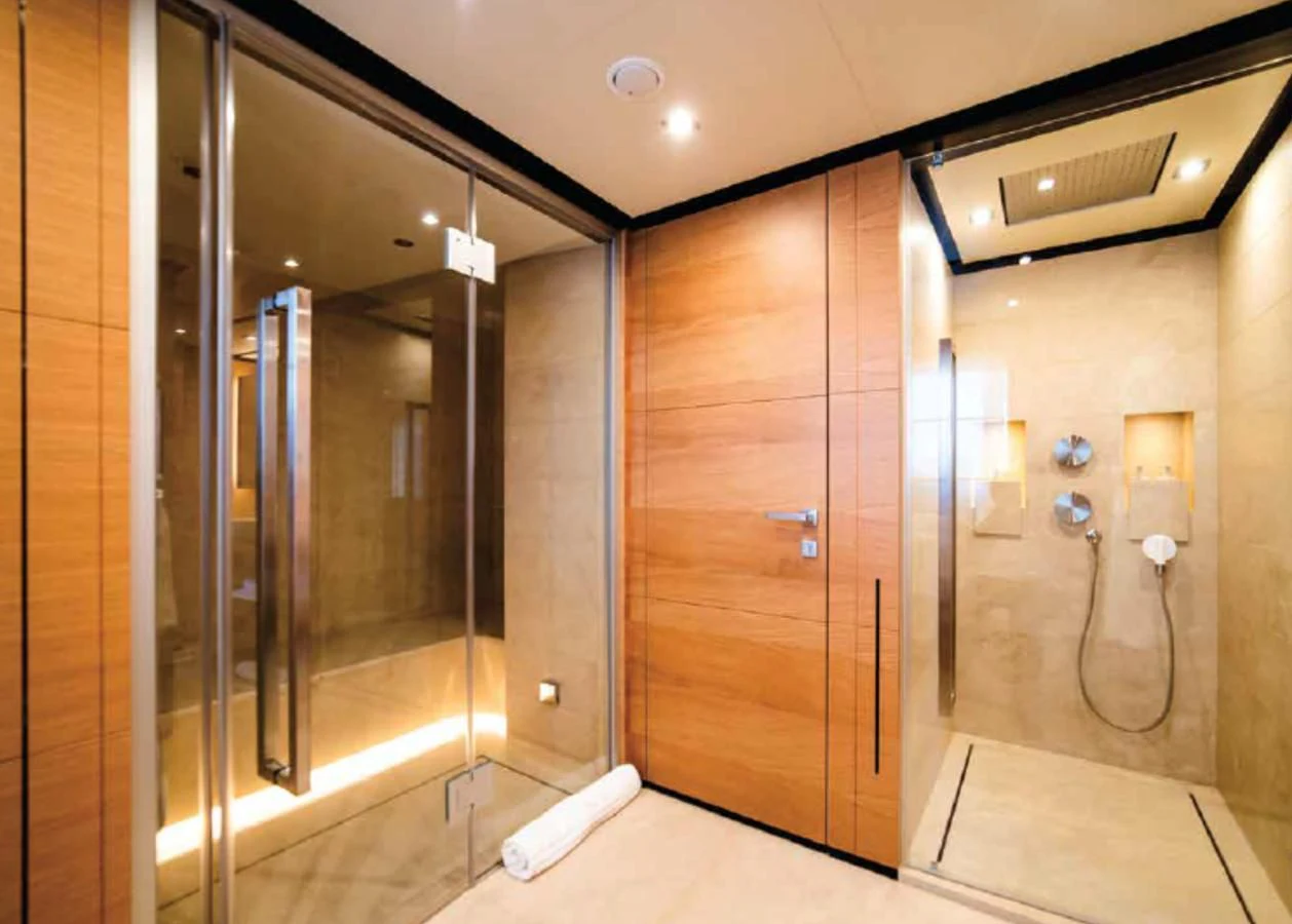 a bathroom with a shower unit and a sink aboard ALI BABA Yacht for Sale