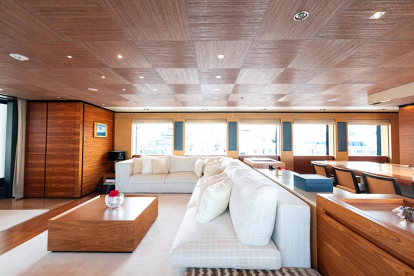 a living room with a couch and a table aboard ALI BABA Yacht for Sale