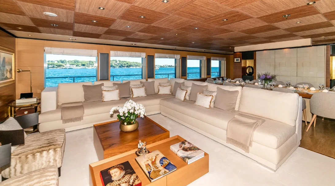 a living room with a large window aboard ALI BABA Yacht for Sale