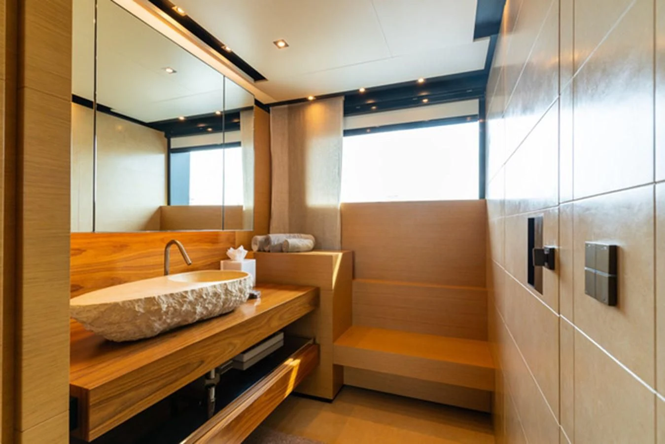 a bathroom with a sink and a mirror aboard ALI BABA Yacht for Sale