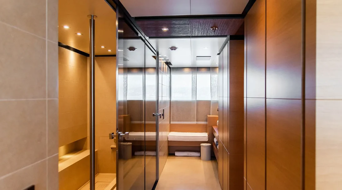 a bathroom with a glass shower aboard ALI BABA Yacht for Sale