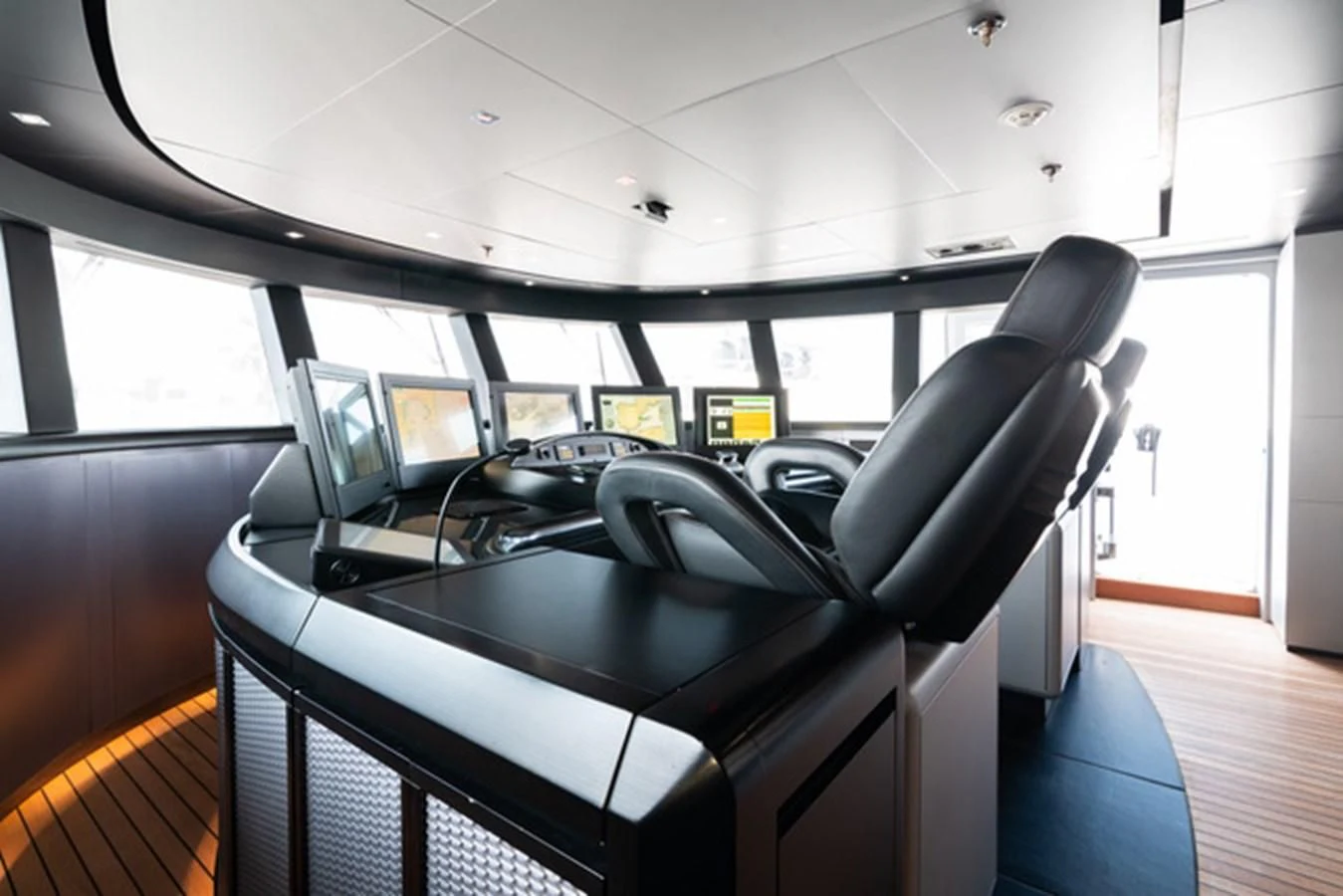 a room with a row of computers aboard ALI BABA Yacht for Sale