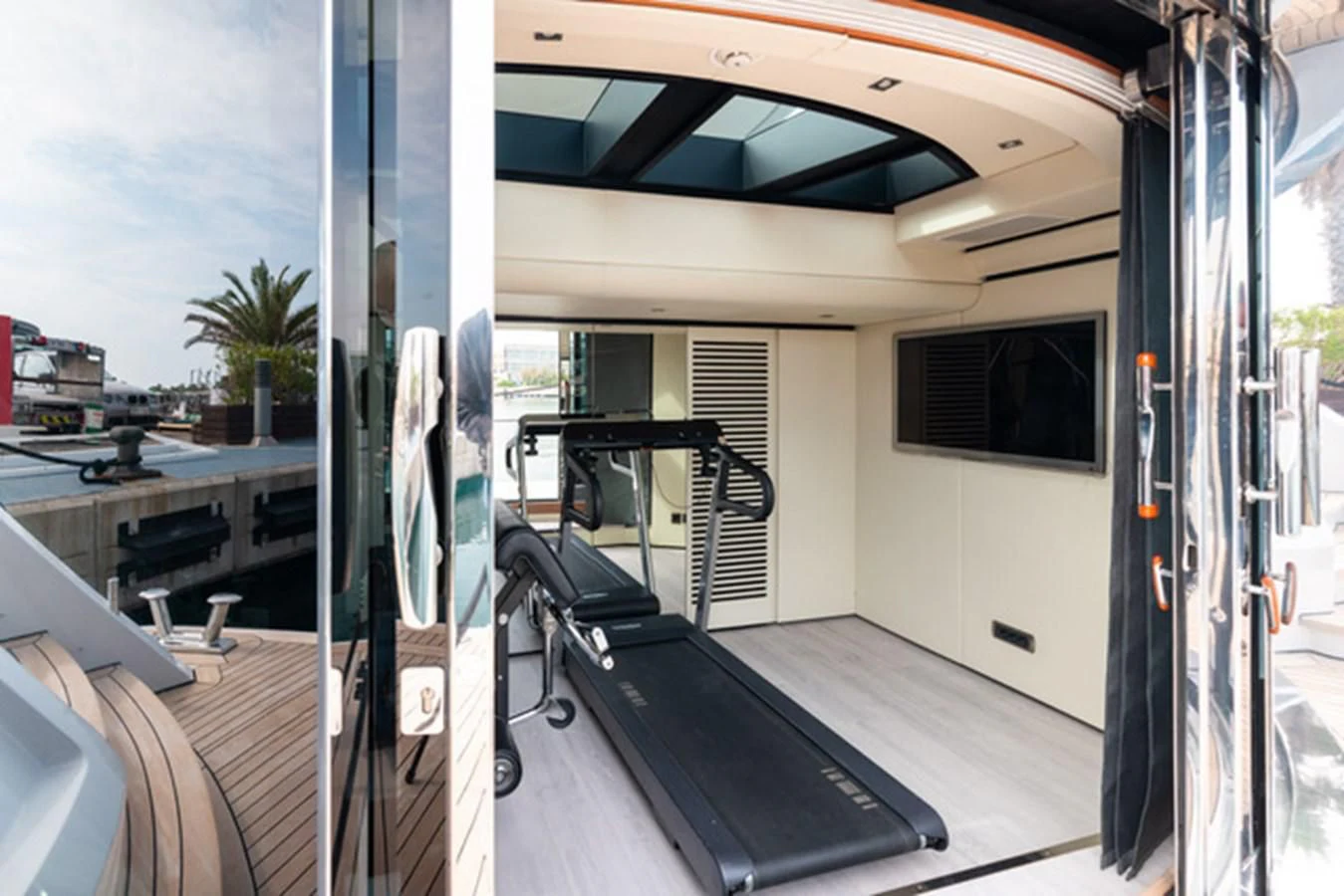 a deck with a large balcony aboard ALI BABA Yacht for Sale