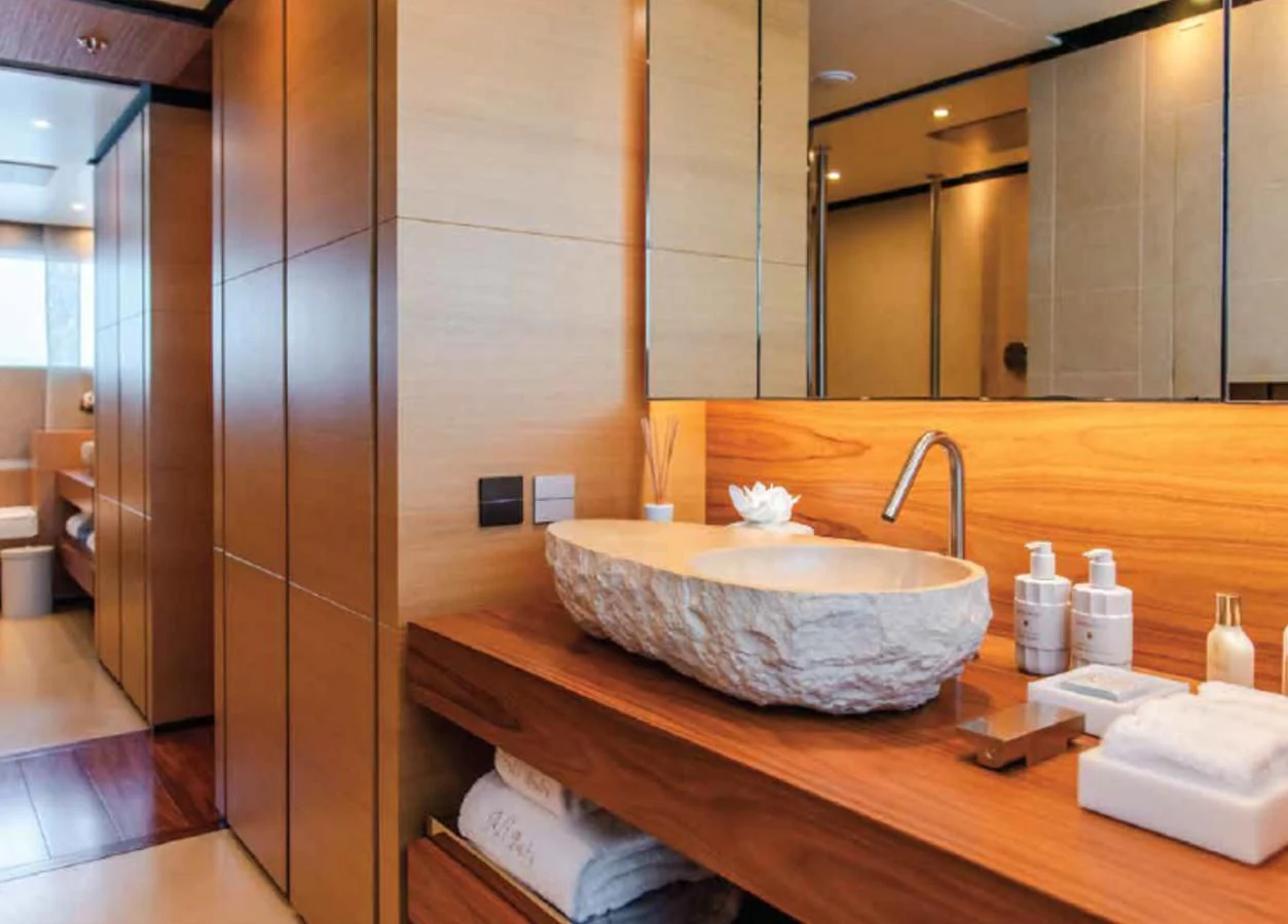 a bathroom with a sink and a mirror aboard ALI BABA Yacht for Sale