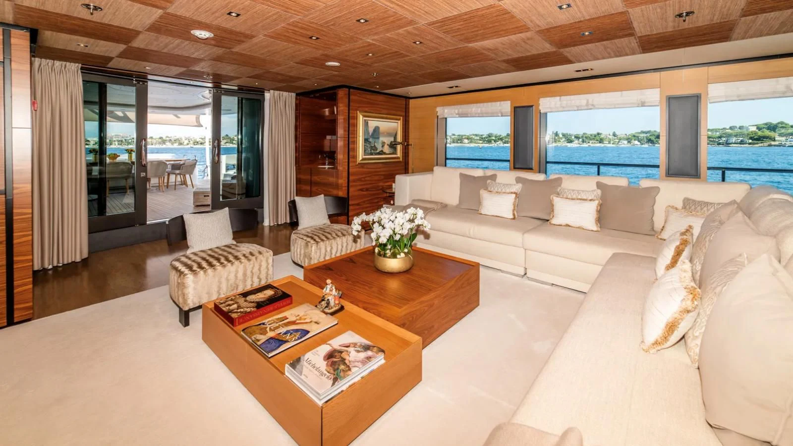 a living room with a large window aboard ALI BABA Yacht for Sale