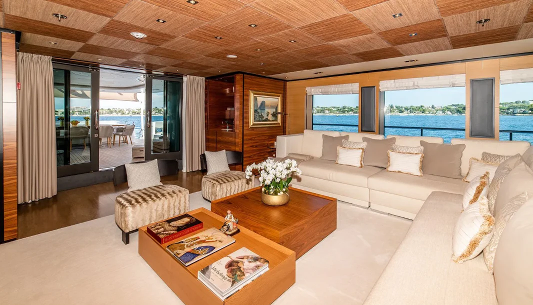a living room with a large window aboard ALI BABA Yacht for Sale