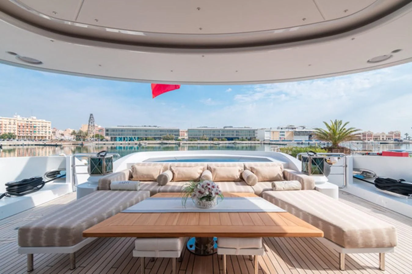 a room with a table and chairs aboard ALI BABA Yacht for Sale