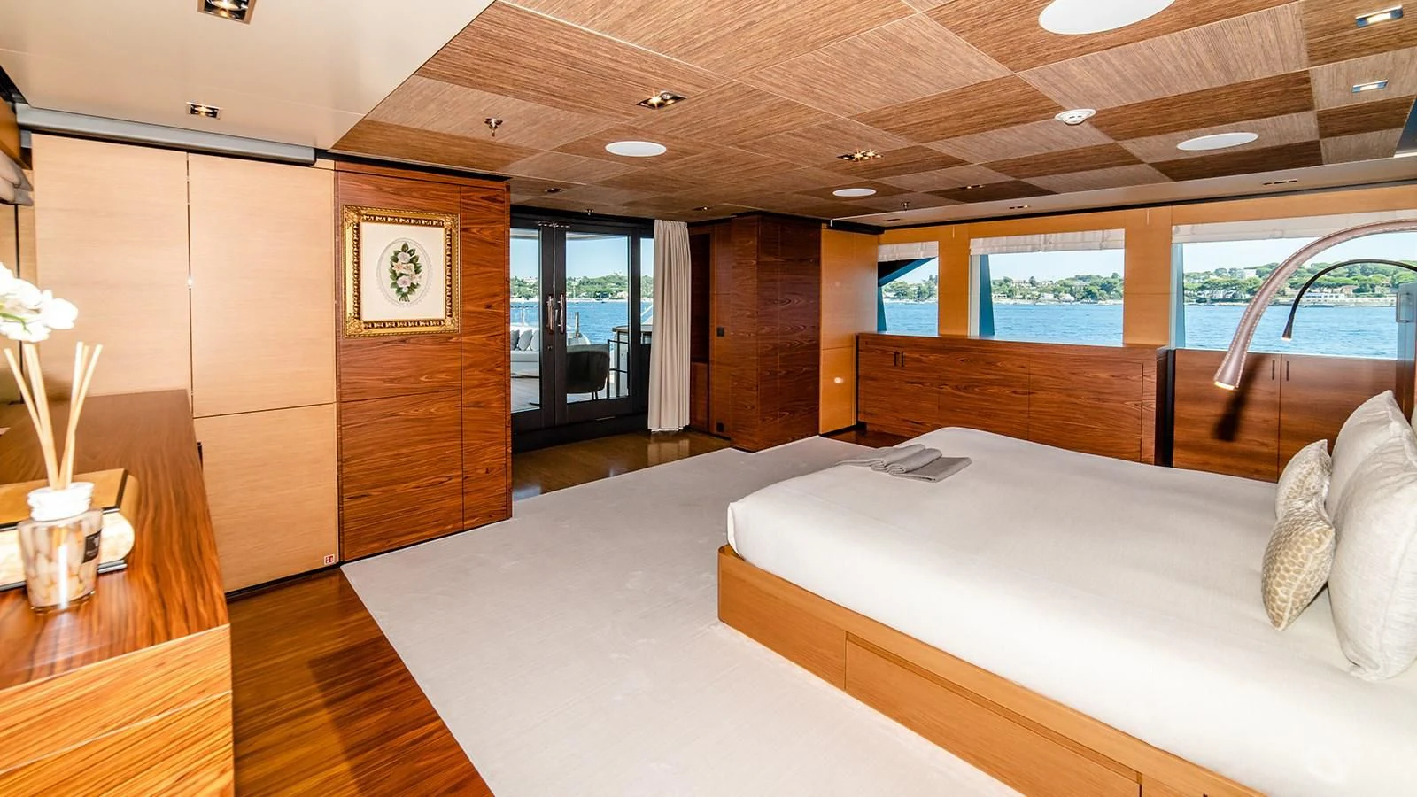 a room with a bed and a table aboard ALI BABA Yacht for Sale