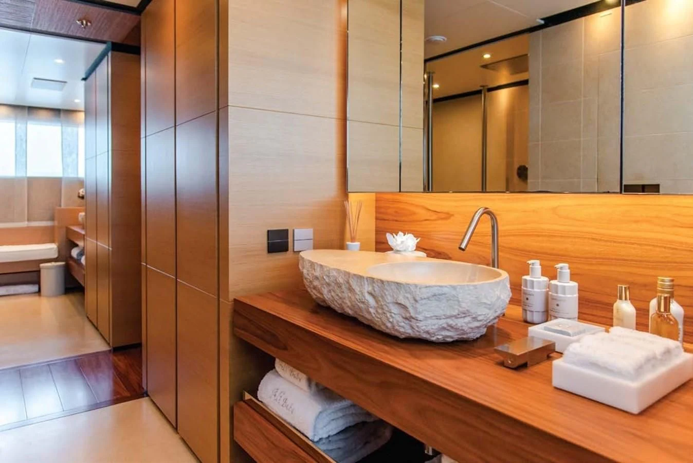 a bathroom with a sink and a mirror aboard ALI BABA Yacht for Sale
