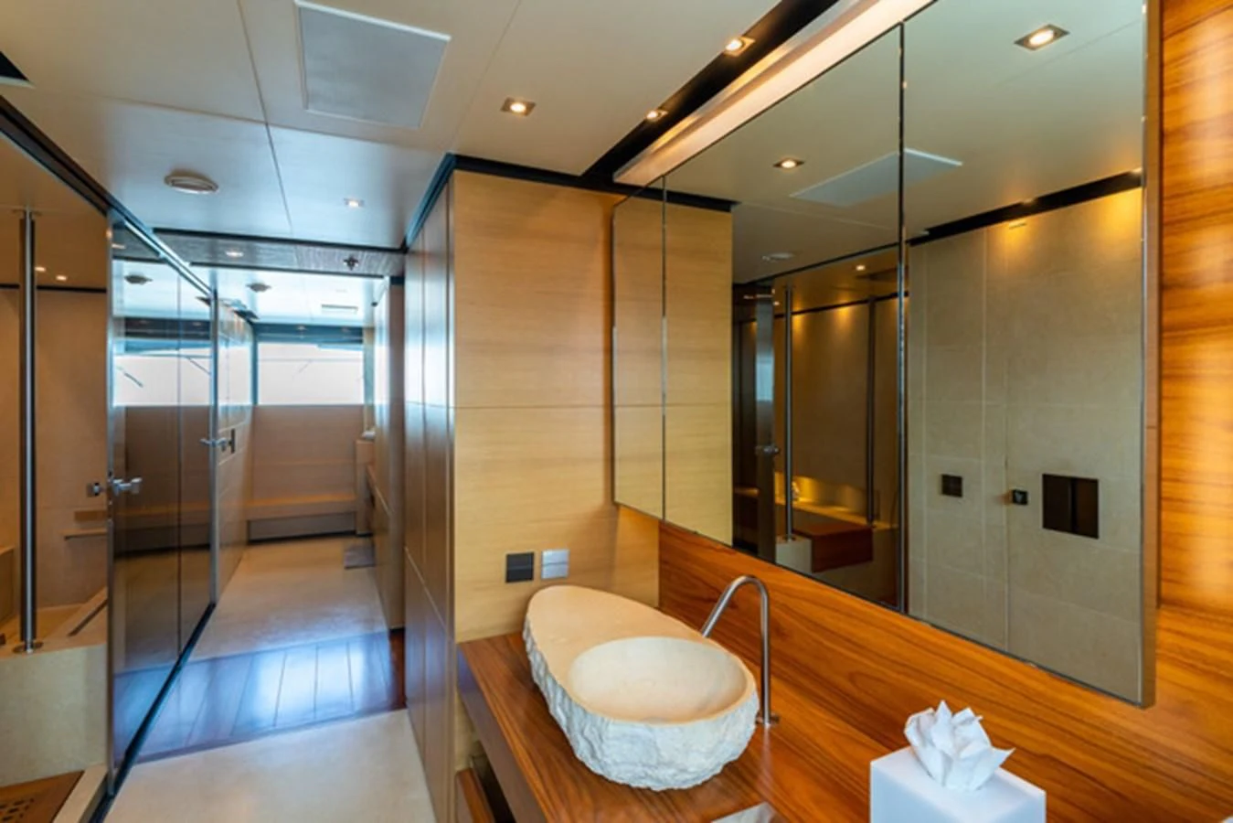 a bathroom with a large mirror aboard ALI BABA Yacht for Sale