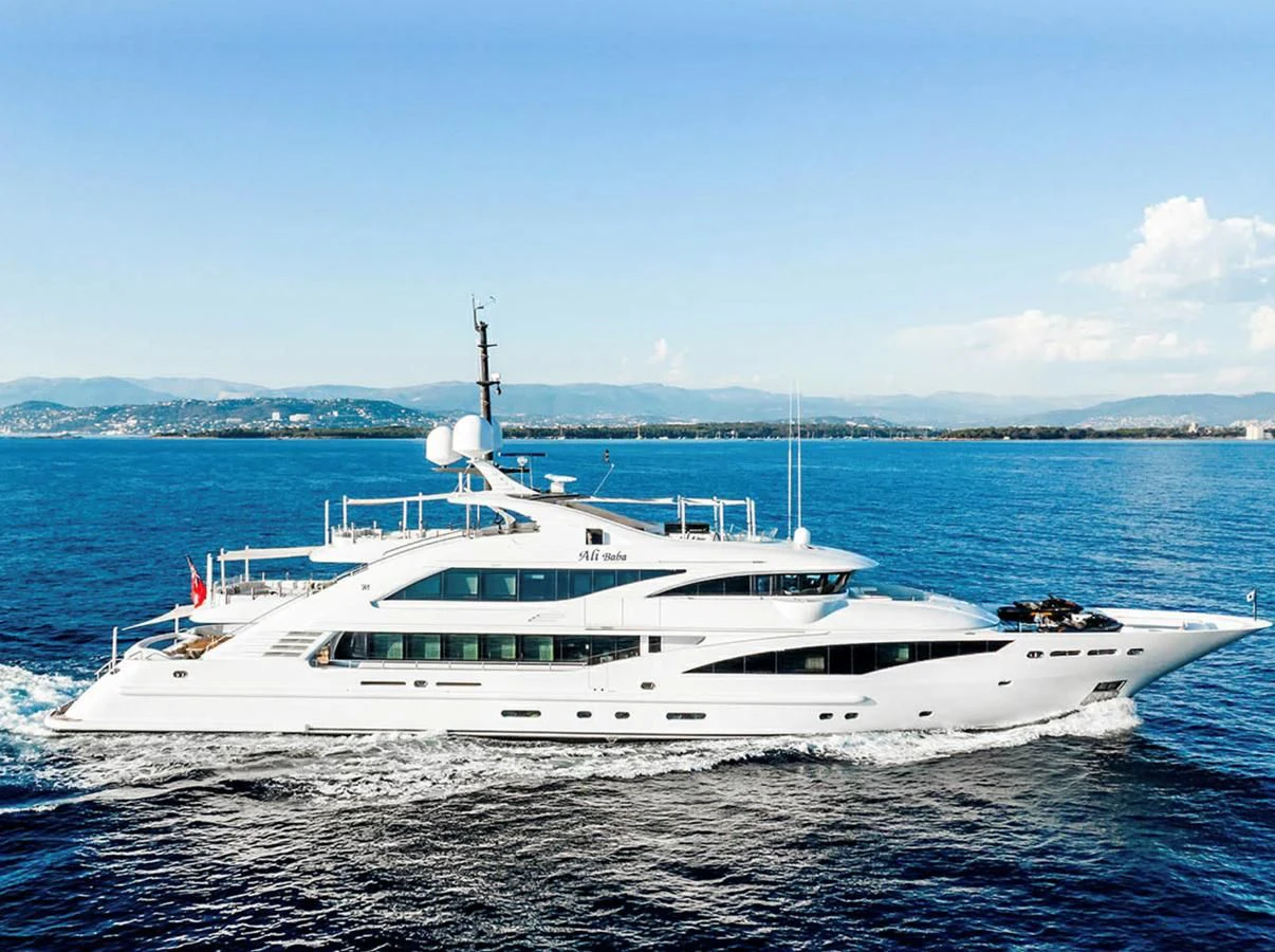 a white yacht in the water aboard ALI BABA Yacht for Sale