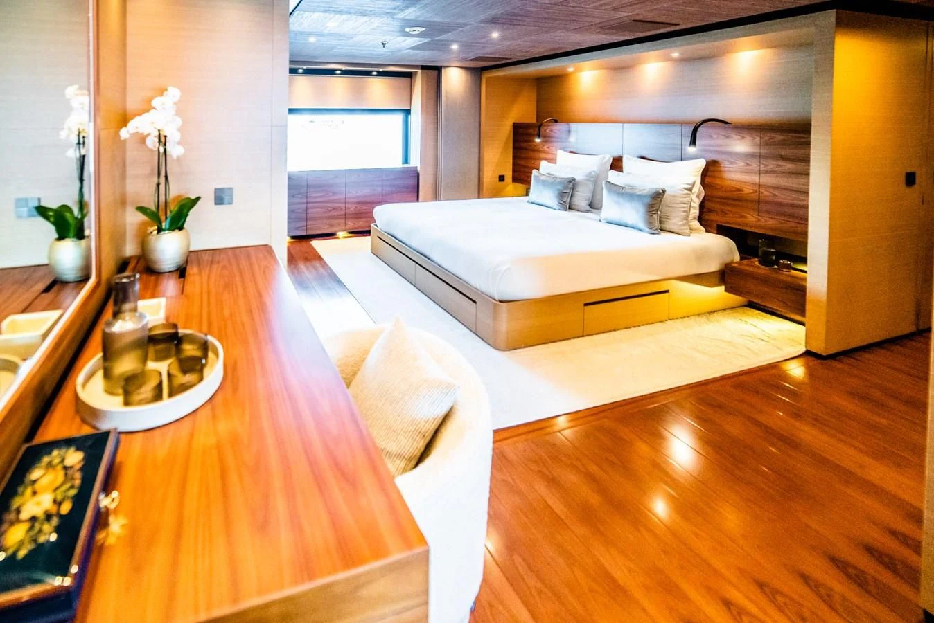 a room with a bed and a table aboard ALI BABA Yacht for Sale