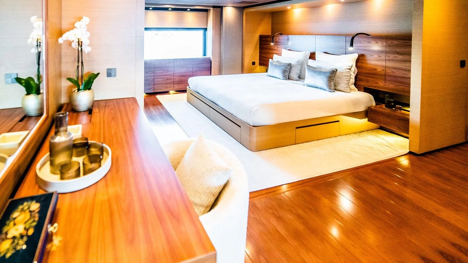 a room with a bed and a table aboard ALI BABA Yacht for Sale