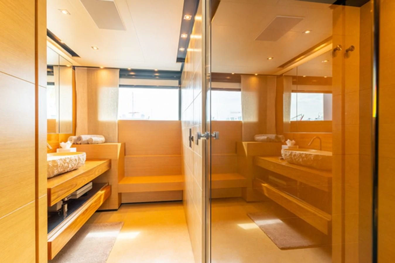 a modern looking room with a glass shower aboard ALI BABA Yacht for Sale