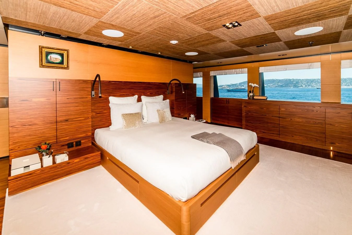 a room with a bed and a desk aboard ALI BABA Yacht for Sale