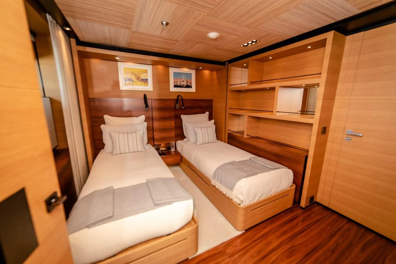 a room with a bed and a wood door aboard ALI BABA Yacht for Sale