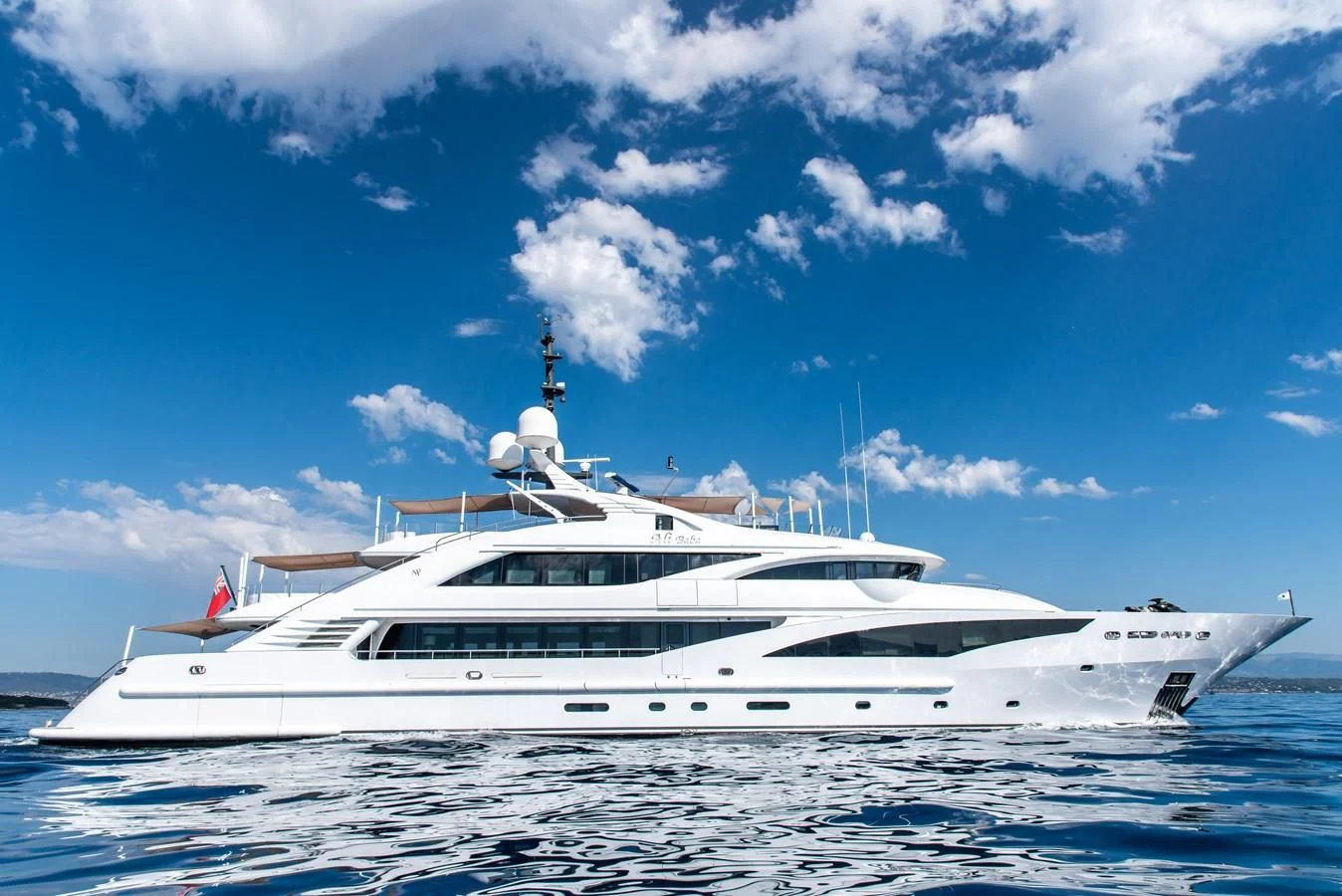 a white yacht in the water aboard ALI BABA Yacht for Sale