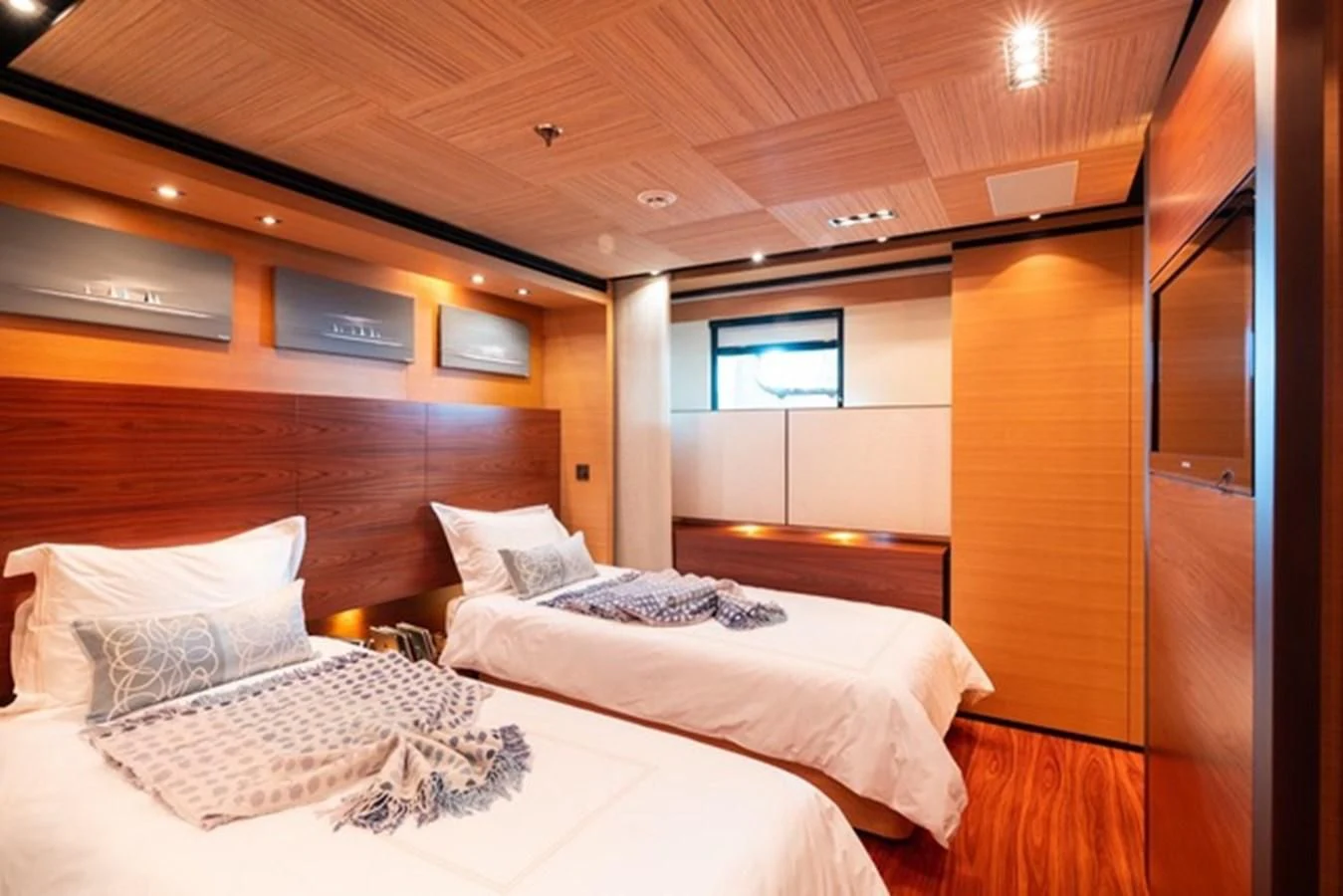 a room with two beds aboard ALI BABA Yacht for Sale