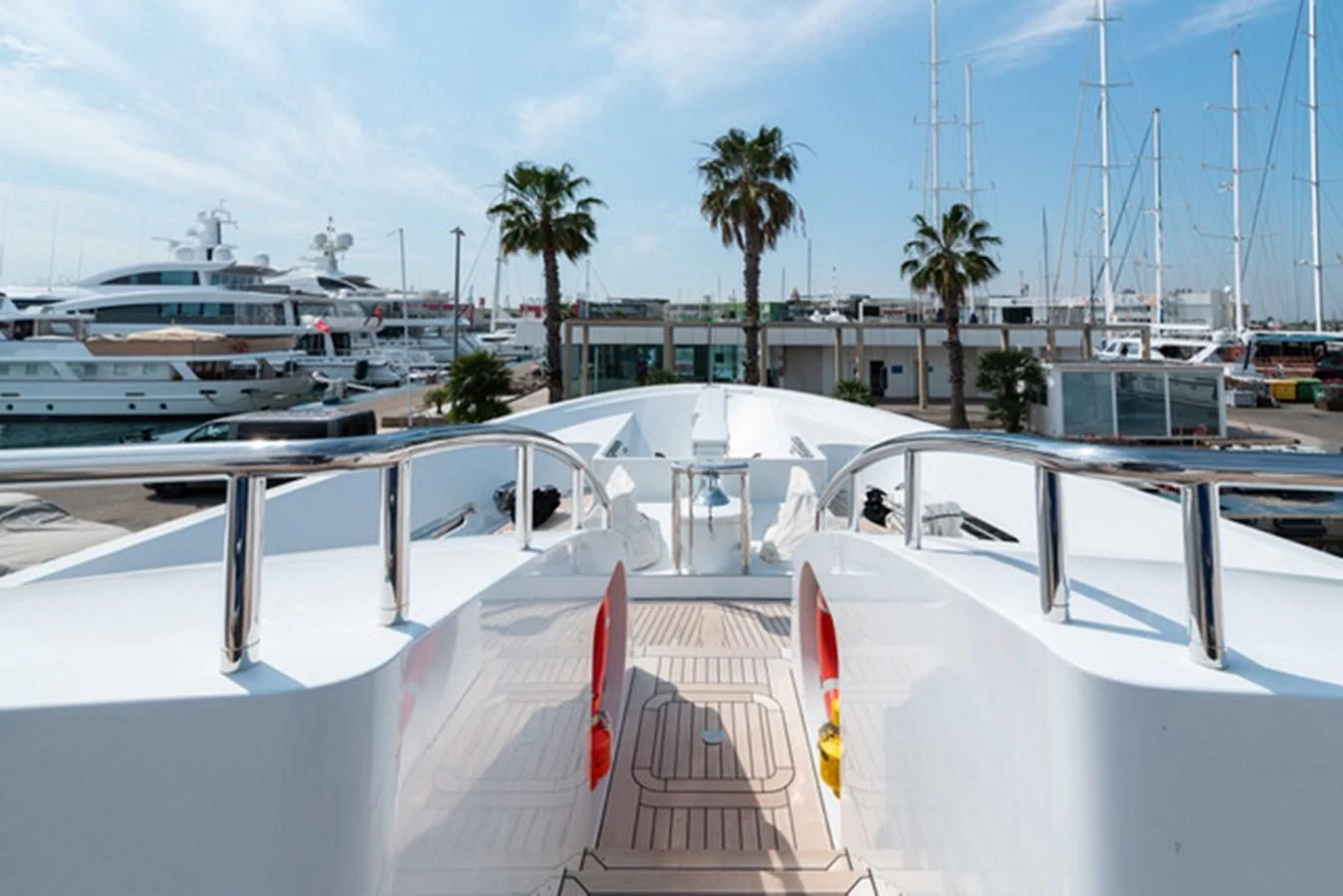a deck with many yachts aboard ALI BABA Yacht for Sale