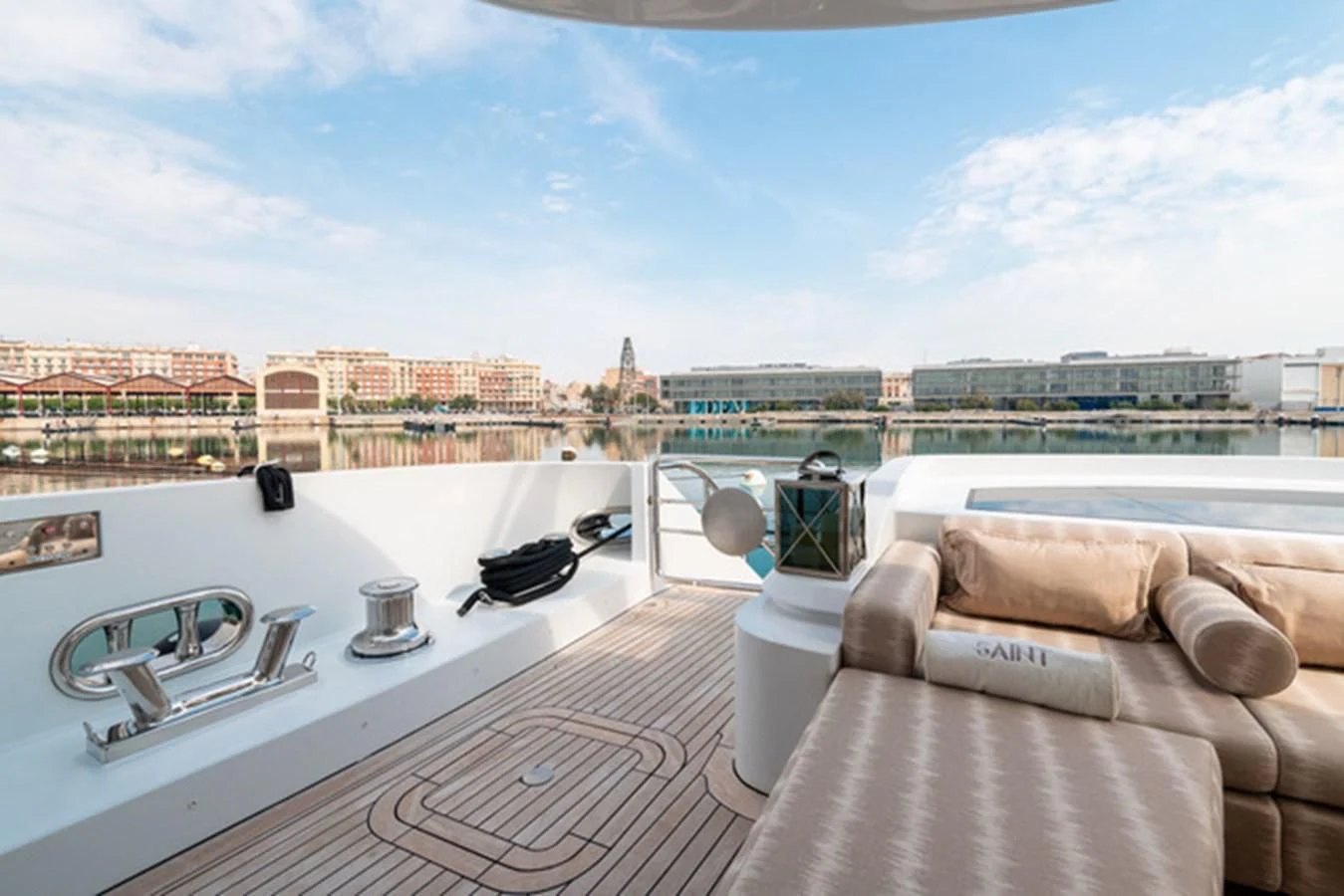 a rooftop with a view of a city and a large body of water aboard ALI BABA Yacht for Sale