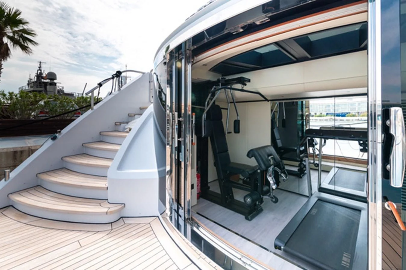 a large white staircase on a deck aboard ALI BABA Yacht for Sale