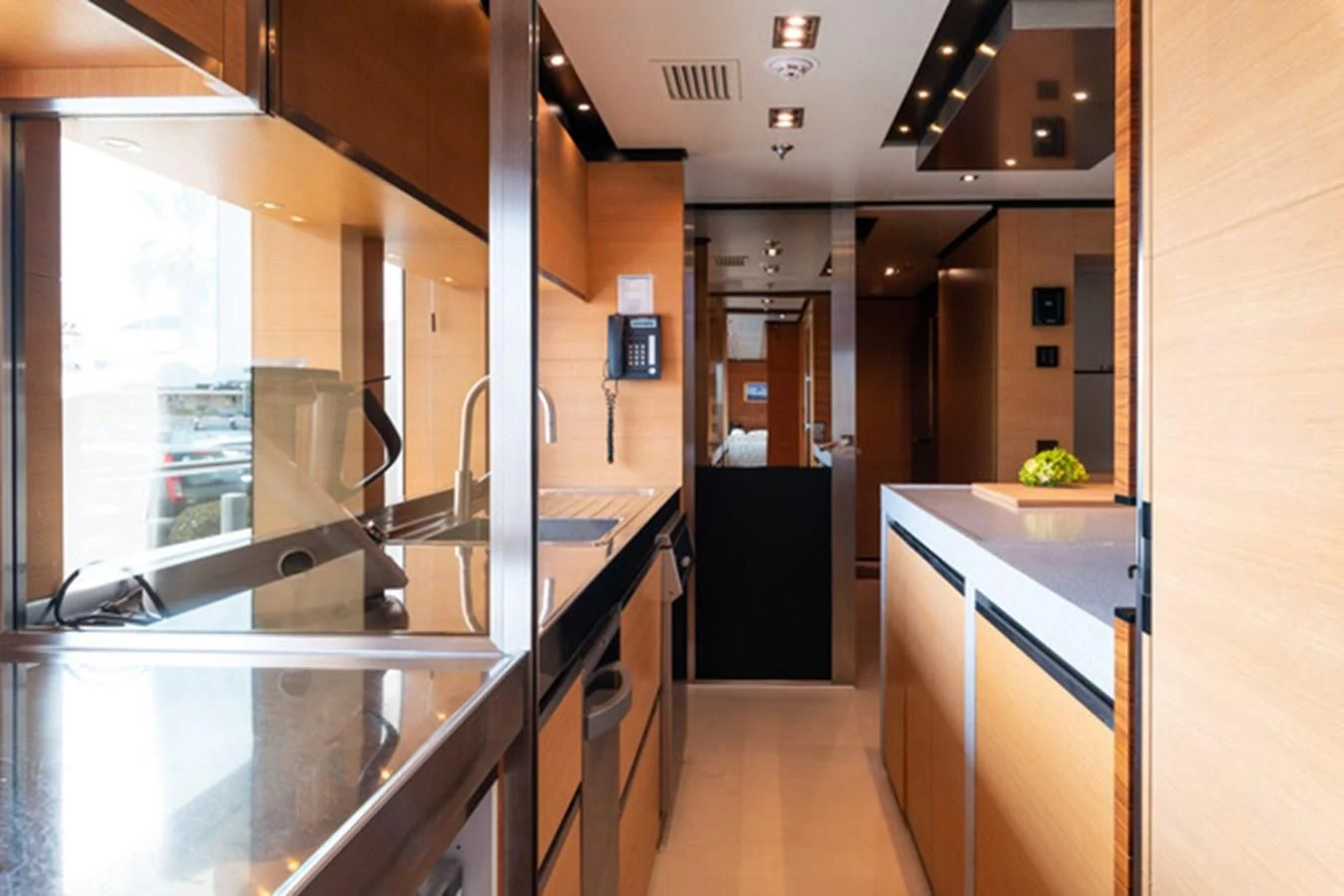 a kitchen with a glass door aboard ALI BABA Yacht for Sale