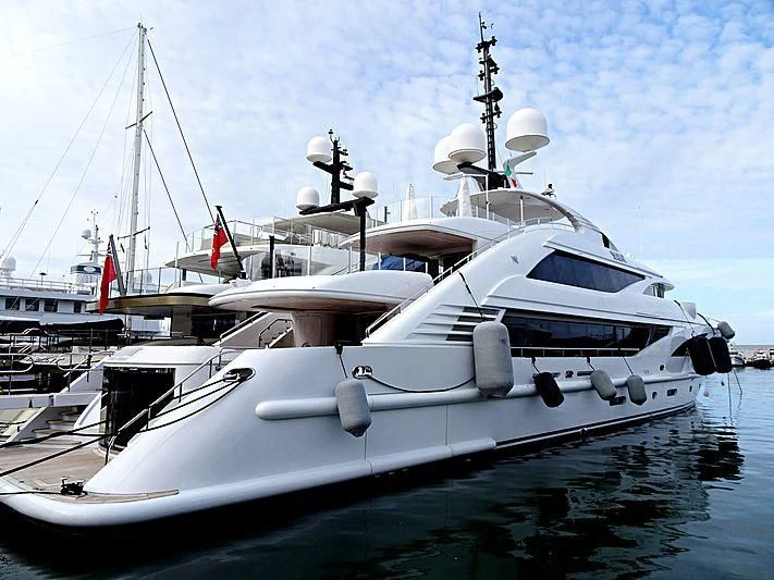 a white yacht docked aboard ALI BABA Yacht for Sale
