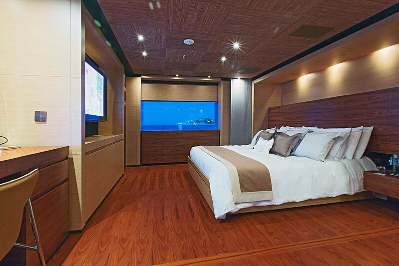 a large bed in a room aboard ALI BABA Yacht for Sale