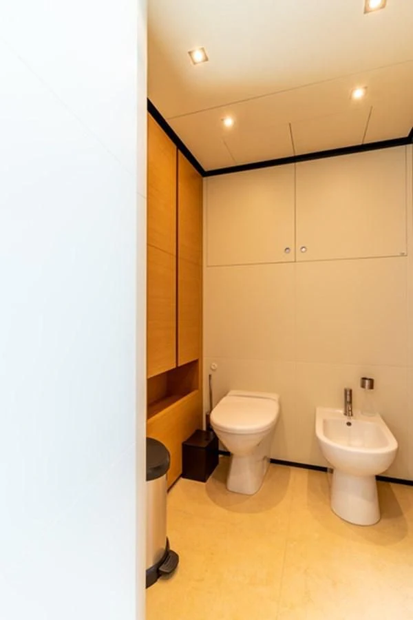 a bathroom with a toilet and a sink aboard ALI BABA Yacht for Sale