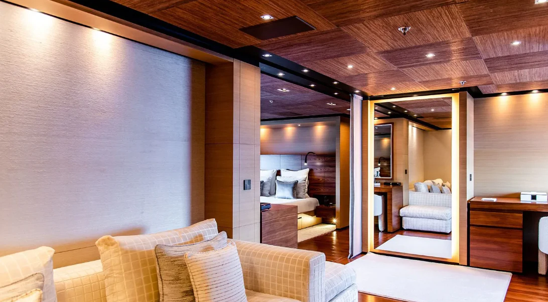 a room with a couch and a table aboard ALI BABA Yacht for Sale